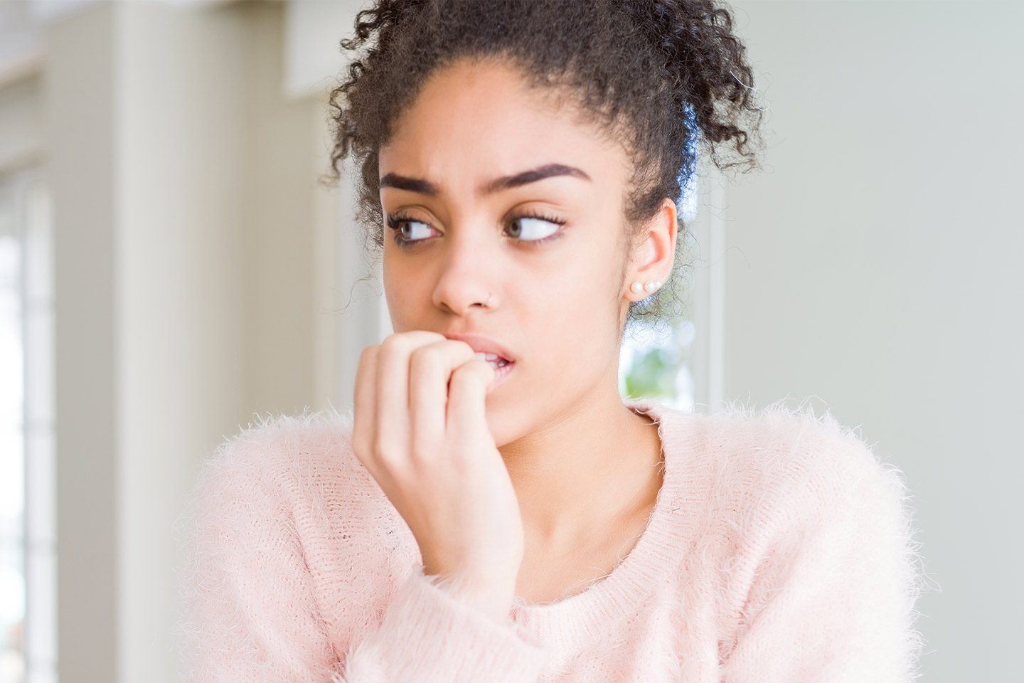 nail health care | girl biting her nails