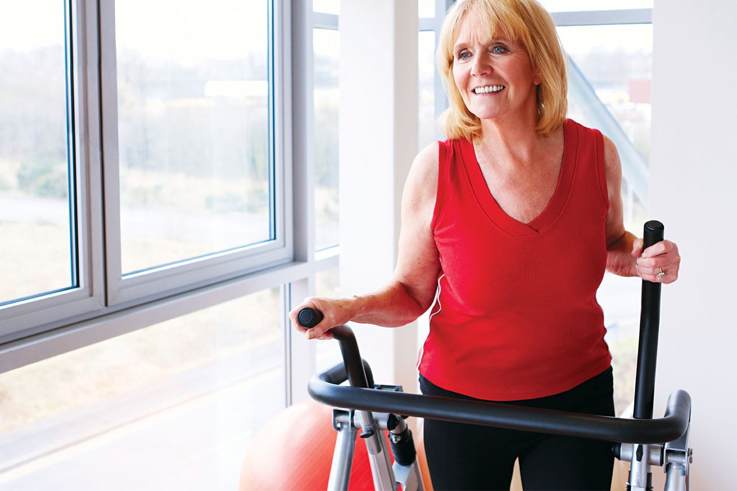Woman working out on exercise machine