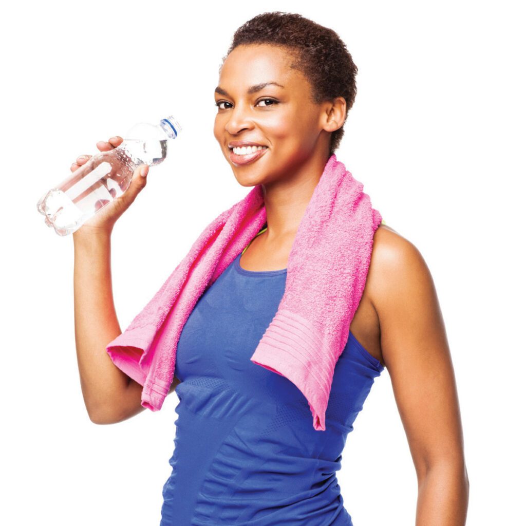 smiling woman drinking water