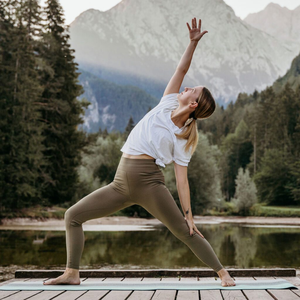 woman doing yoga outdoors