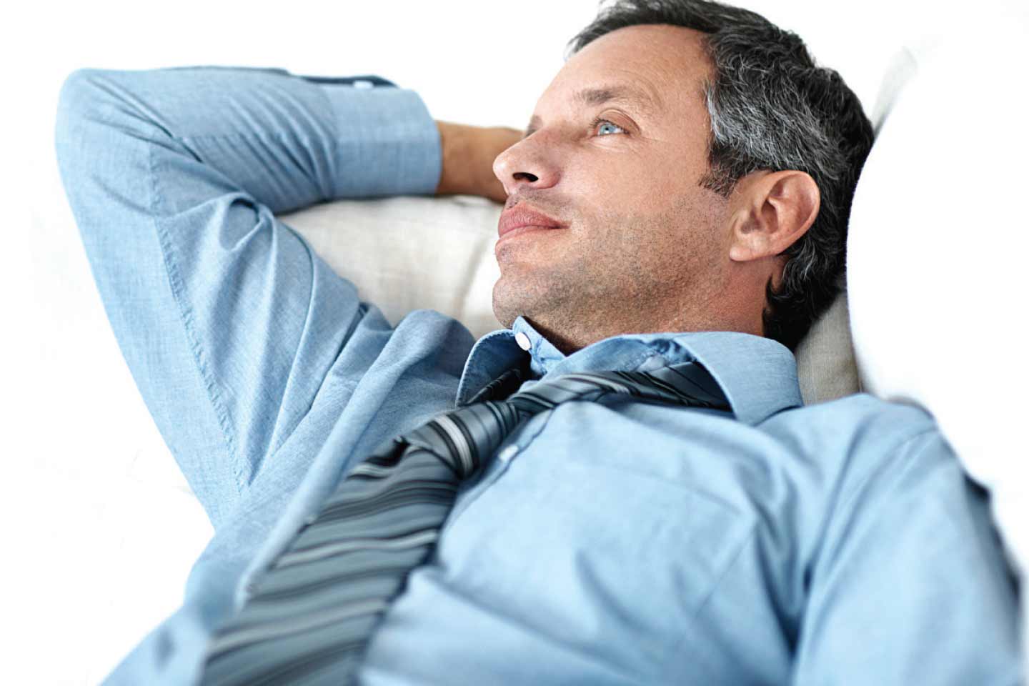 Man lying down on couch