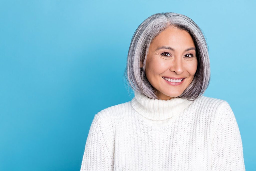 mature woman with healthy teeth and gums