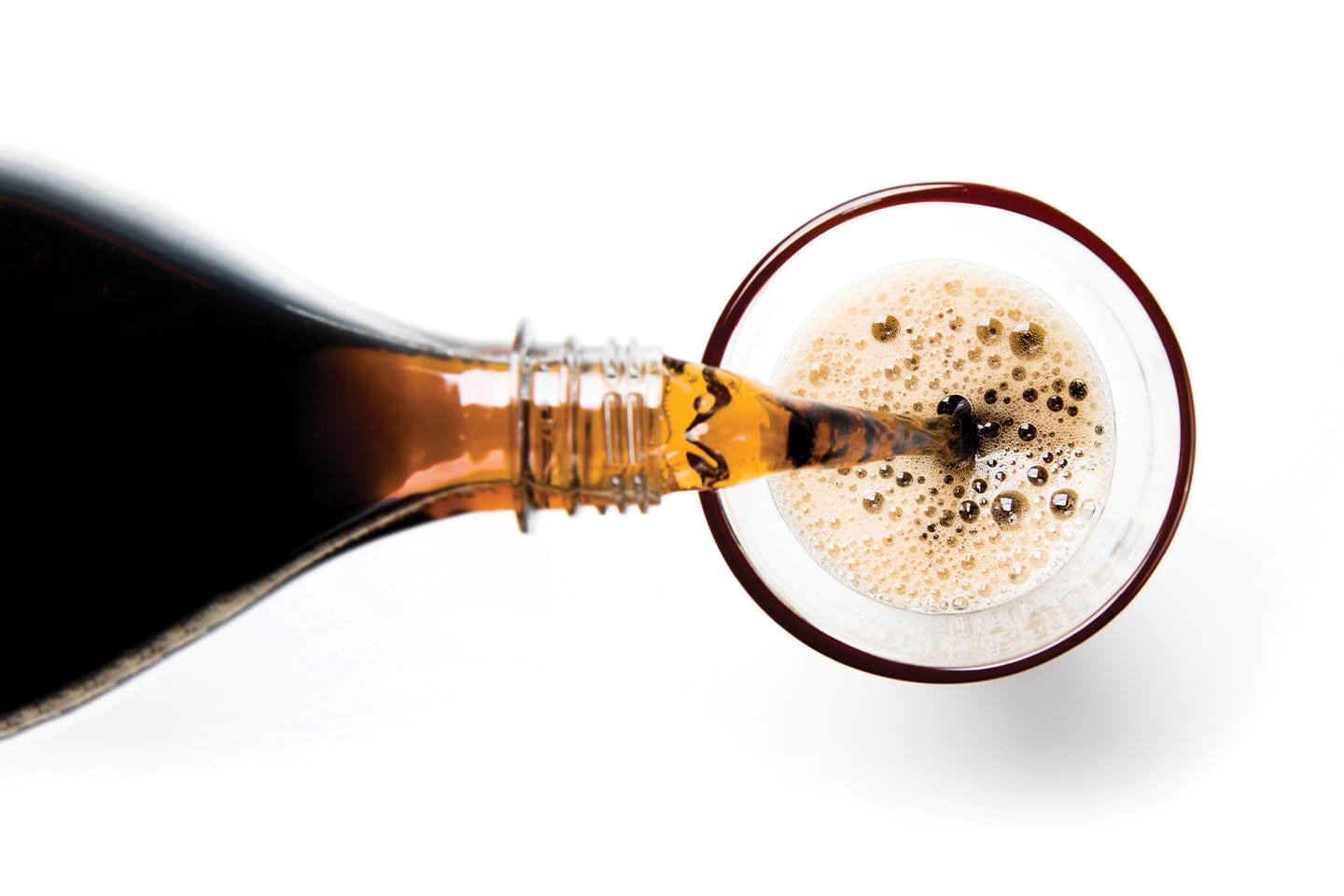 coke soda pop being poured into a glass avoid things bad for your bones in chattanooga