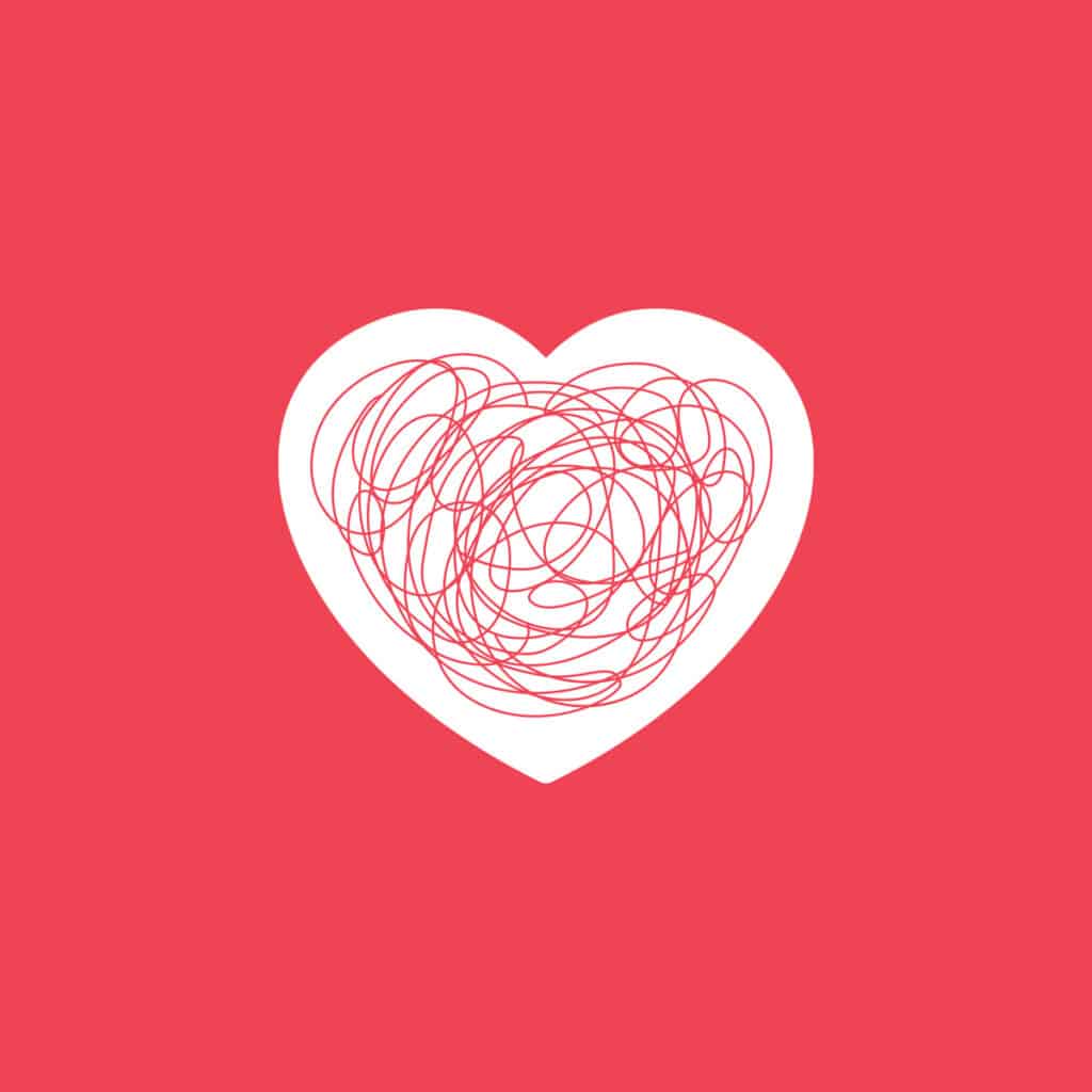 red heart full of scribbles with red background