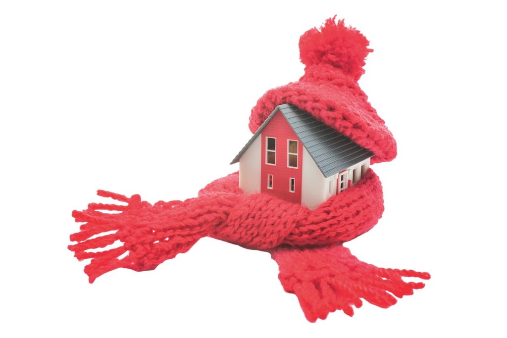 home with a knit hat and scarf for the winter