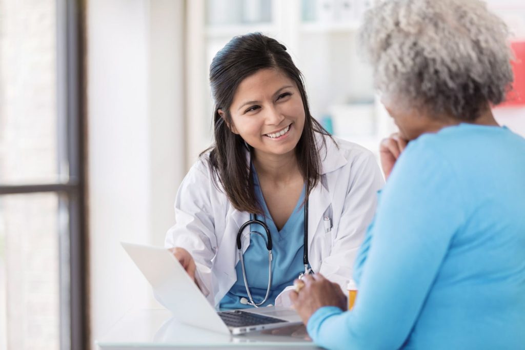 nurse talking to hypochondriac patient