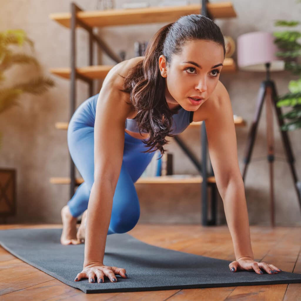 woman exercising indoors