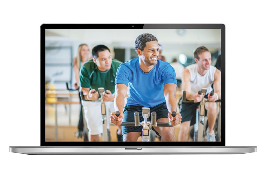 health in a minute late summer 2021 | Virtual Spin Class being streamed on a laptop
