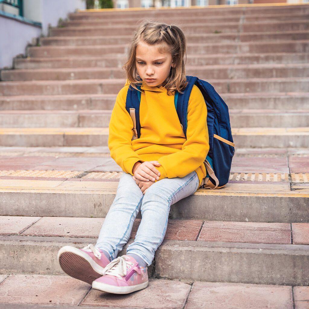 Child sitting on stairs