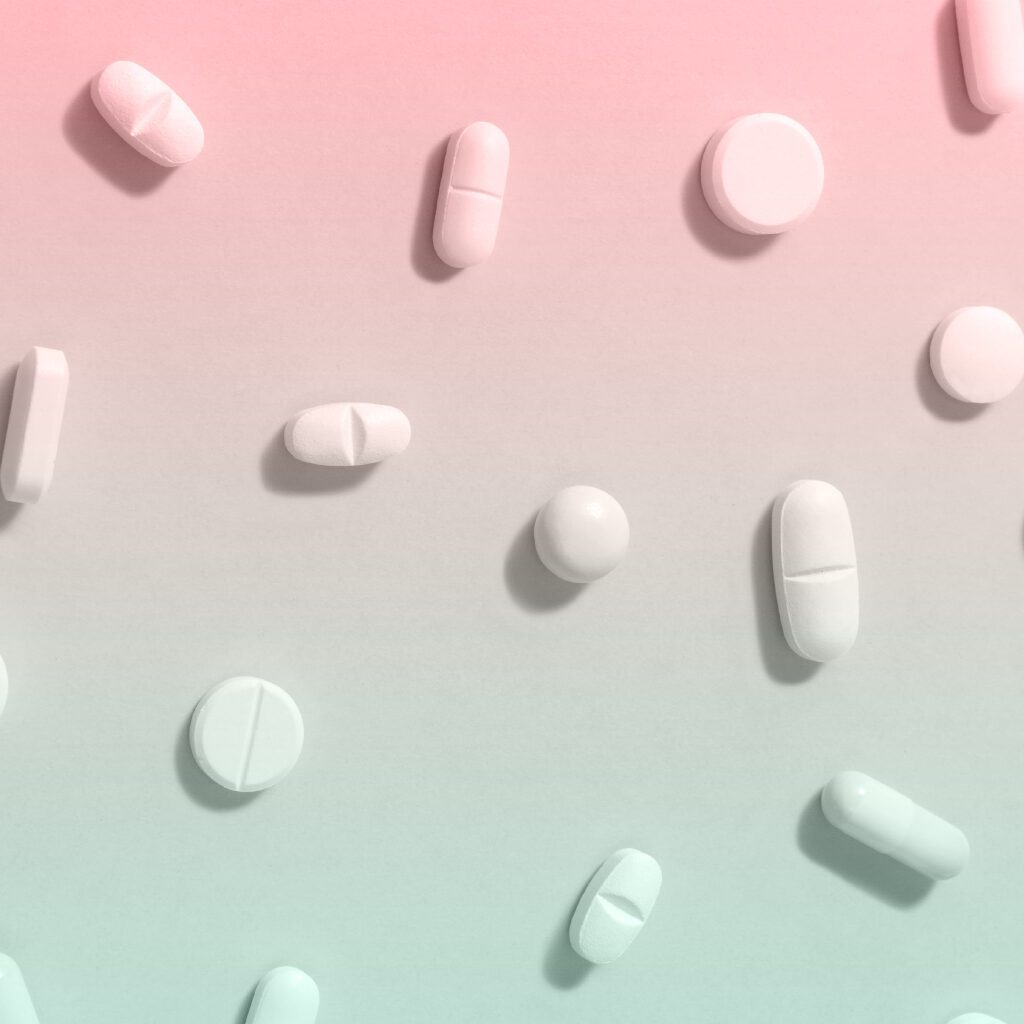 pills in colored background