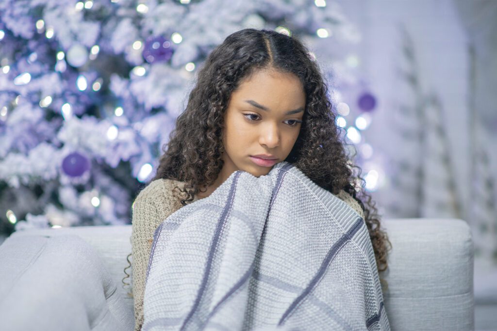 seasonal depression | depressed young woman in holidays