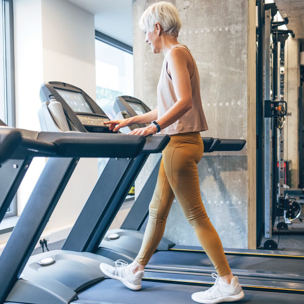 elderly women on a treadmill