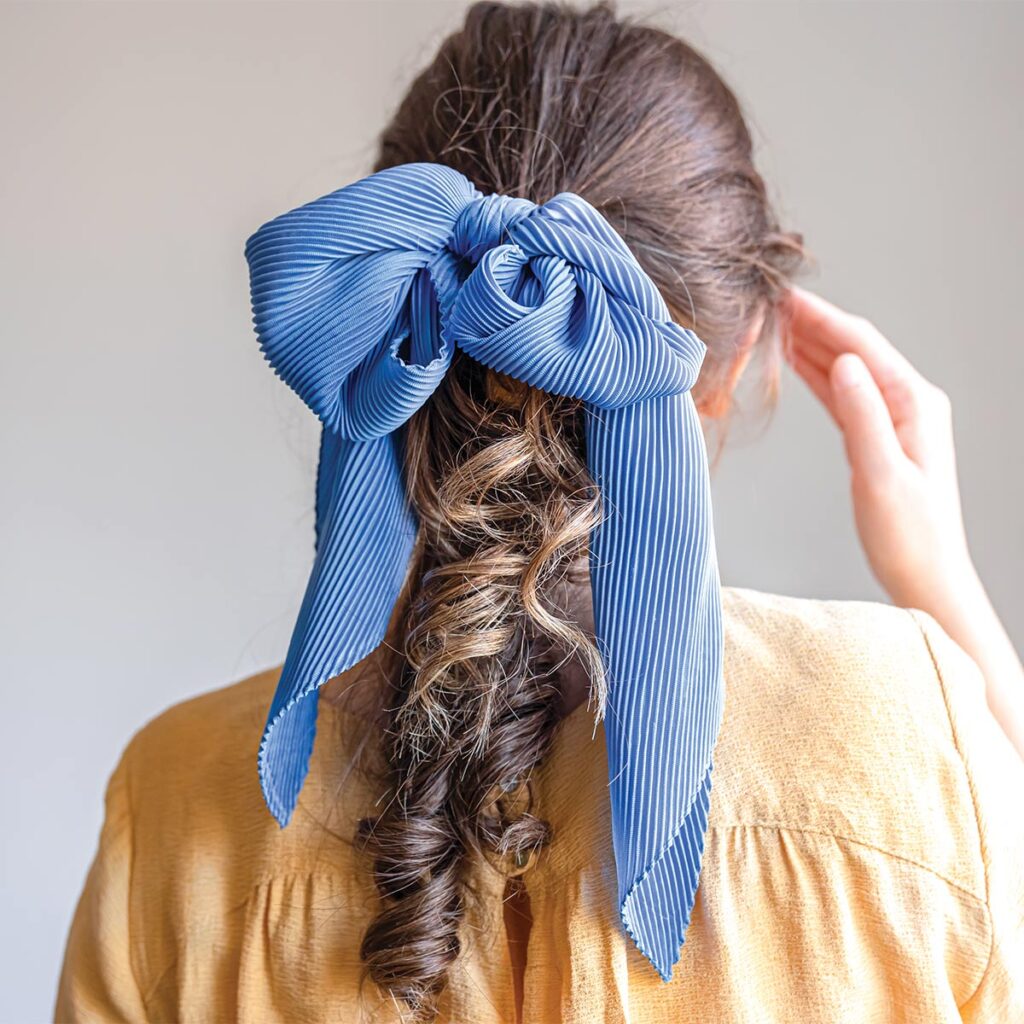 woman wearing hair scarf bow